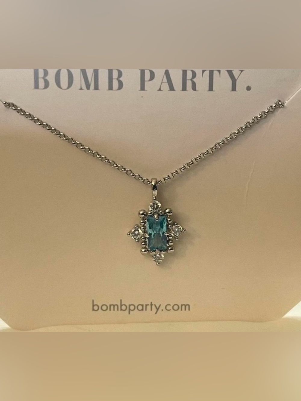 Bomb Party “Fierce in Sparkle” Aqua Topaz CZ Pendant Necklace | Rhodium Plated